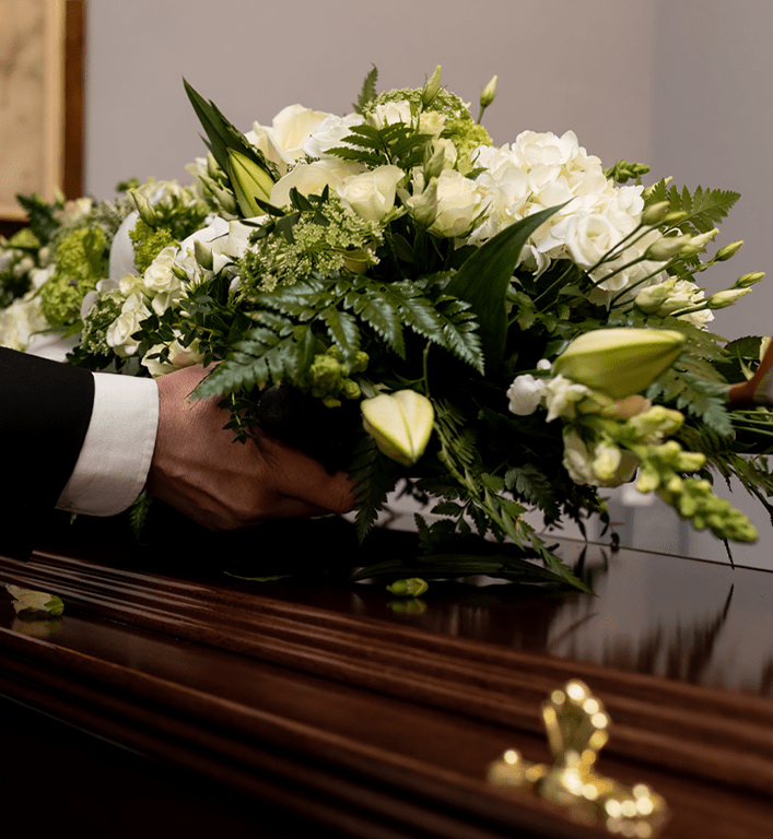 White flowers on coffin